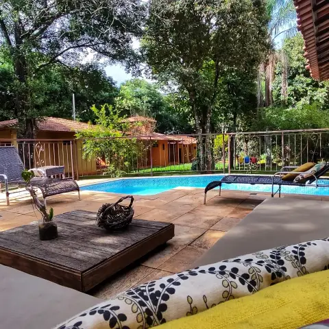 Vista da área da piscina da Pousada OPICODOCIPO