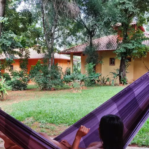 Varanda com rede de apartamento da Pousada OPICODOCIPO